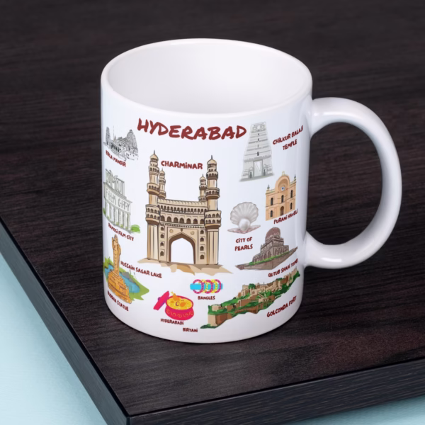 Hyderabad-themed ceramic coffee mug featuring illustrations of Charminar, Golconda Fort, Birla Mandir, and Hyderabadi Biryani