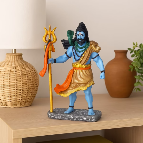 Handcrafted Lord Shiva idol with blue body, golden attire, holding Trishul – spiritual home decor statue