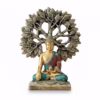 Decorative Buddha statue in colorful robes seated under a stylized Bodhi tree with detailed leaves.