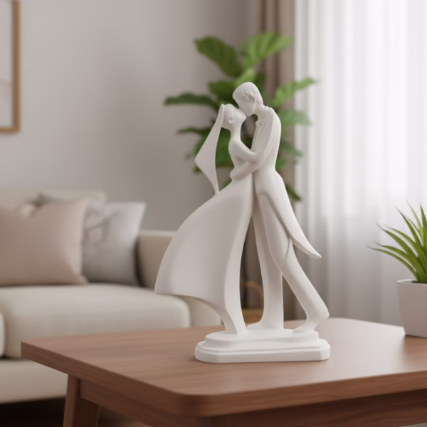 White elegant sculpture of a bride and groom in a romantic embrace, made from smooth resin, ideal for wedding home decor.